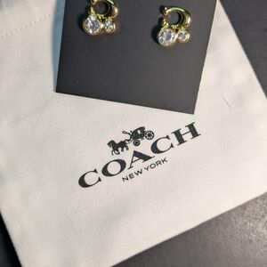 Coach gold stud earrings